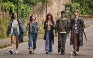 The cast in a scene where they are going to school (Image via Netflix)