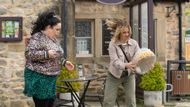 Gabby smashes her birthday cake out of Mandy's hands on Emmerdale | Image Source: ITV