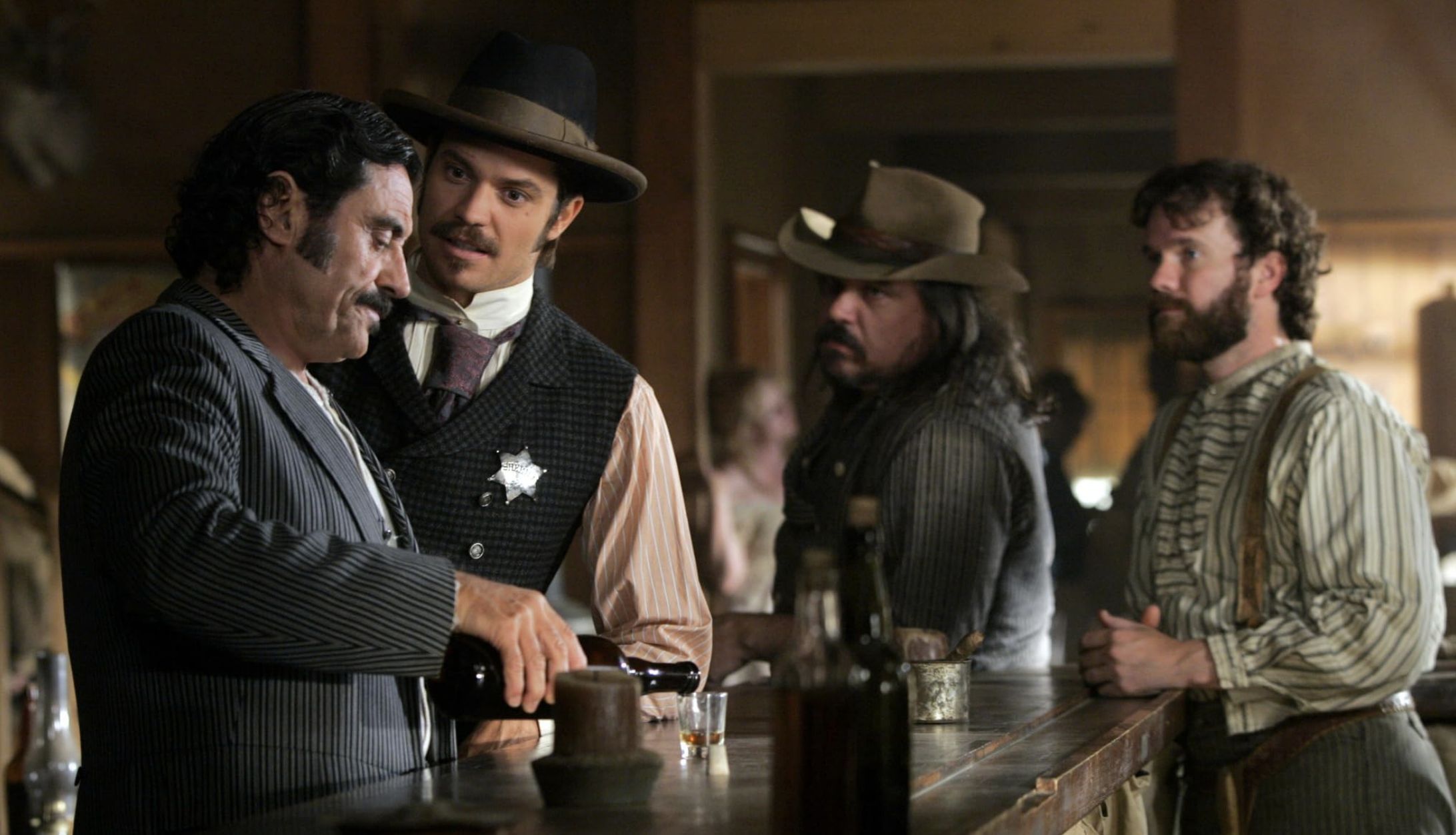 Sean Bridgers, W. Earl Brown, Ian McShane, and Timothy Olyphant in Deadwood (Images via HBO)