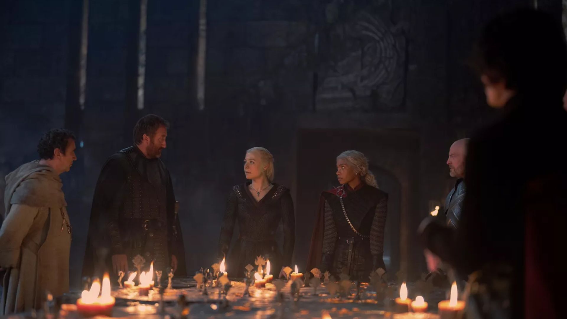 Rhaenyra has dinner with her new dragon riders (Image via HBO)