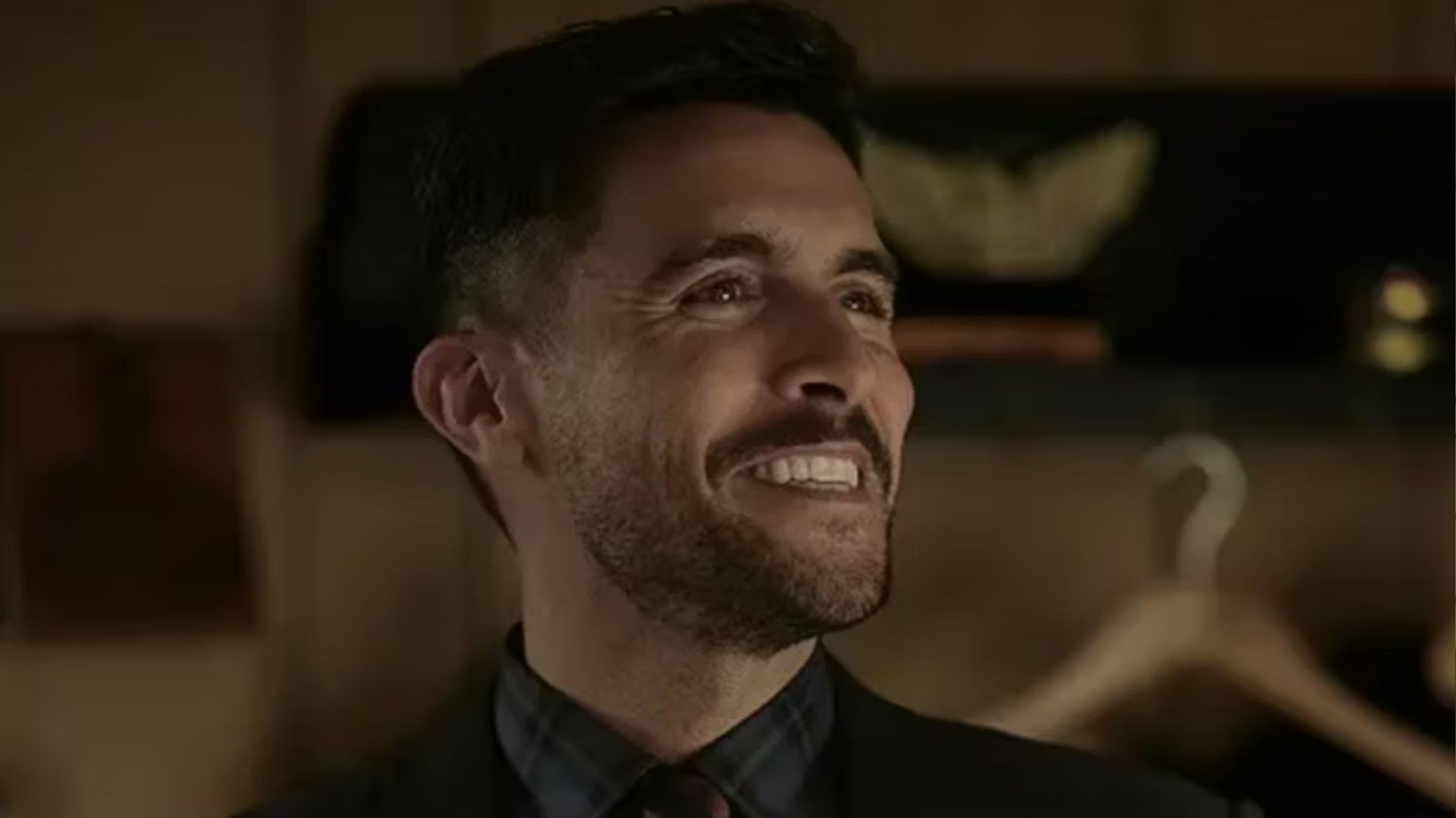 Josh Segarra as Brooks Rizzo (Image Source - Netflix)