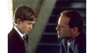 Bruce Willis as Dr. Malcolm Crowe & Haley Joel Osment as Cole Sear (Image via Disney+, Hollywood Pictures)