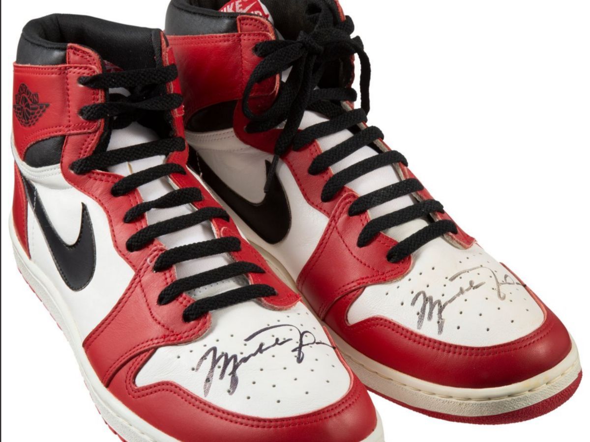 Michael Jordan after winning his first championship title for the Bulls in 1991, where these shoes were signed (Image via Heritage Auction)