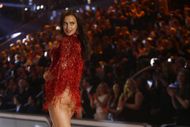 Irina Shayk graces the runway at the 2016 Victoria's Secret Fashion Show in Paris, November 30, 2016. (Image via Getty/Mehdi Taamallah)