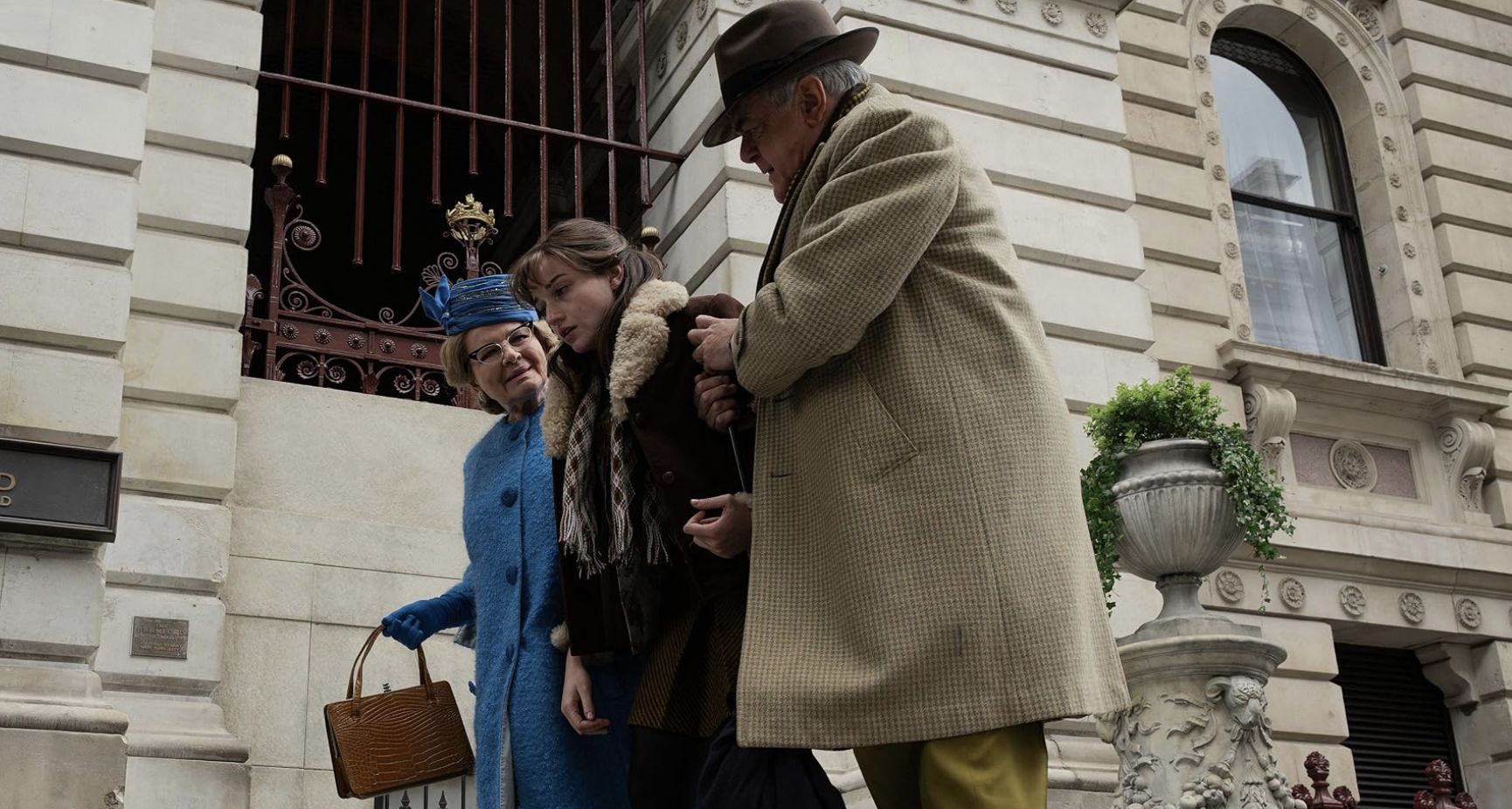 Dianne Wiest, Kevin McNally, and Julia Garner in the horror movie (Image via Paramount+)