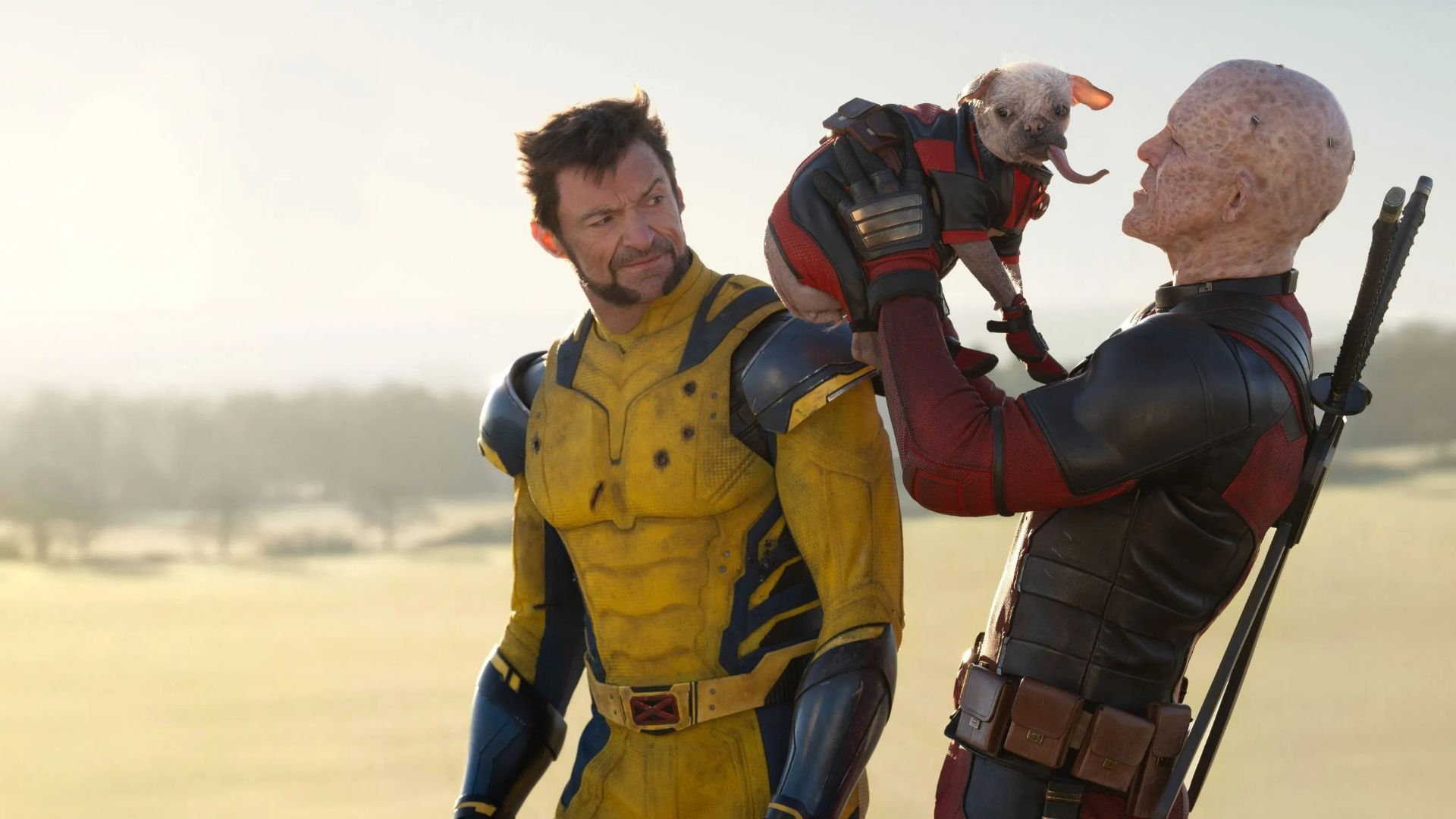 Wolverine with Deadpool and his pet Dogpool (Image Source: Walt Disney Studios Motion Pictures)