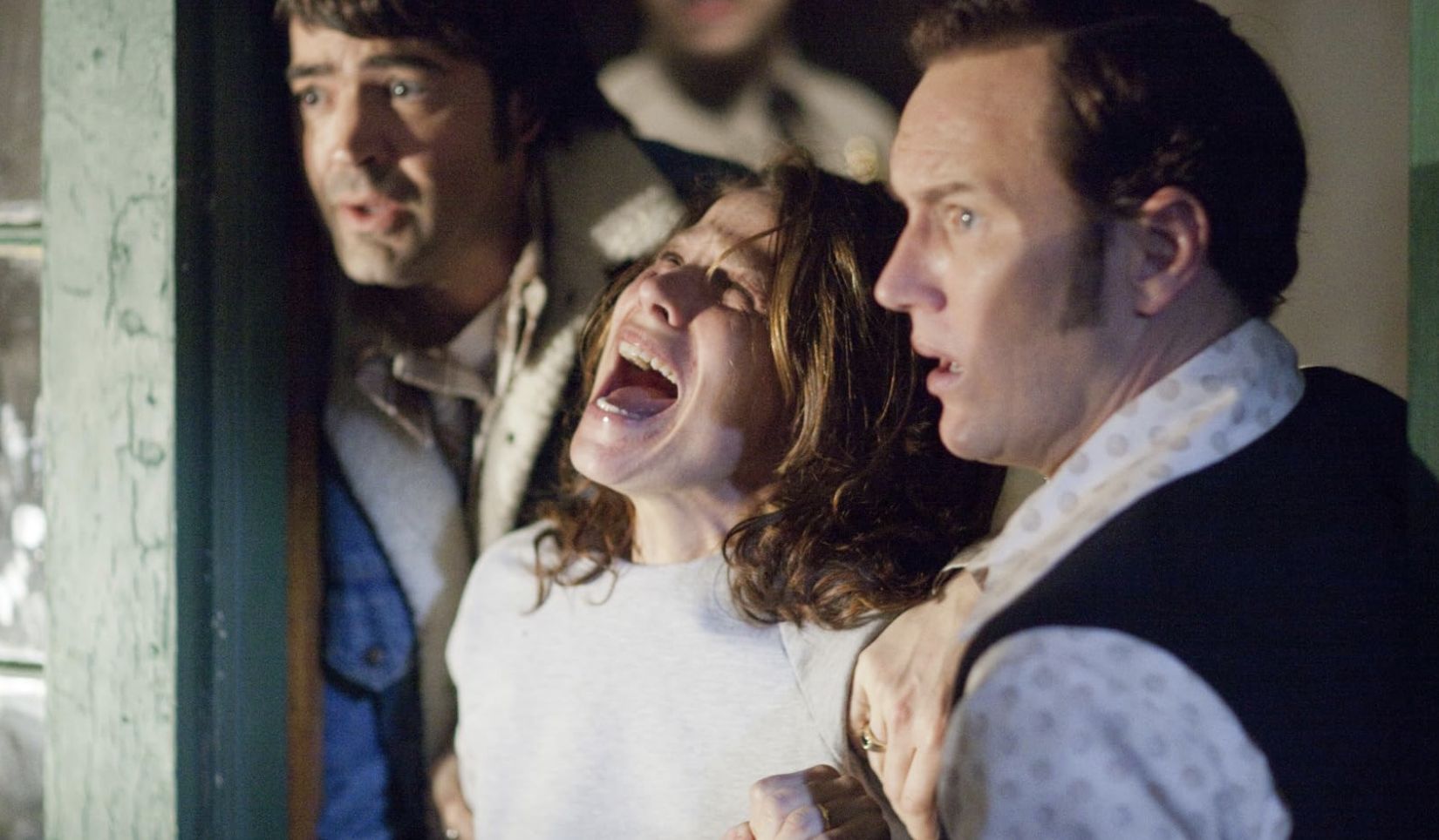 Lili Taylor, Ron Livingston, Patrick Wilson, and John Brotherton in The Conjuring (Image via New Line Cinema)