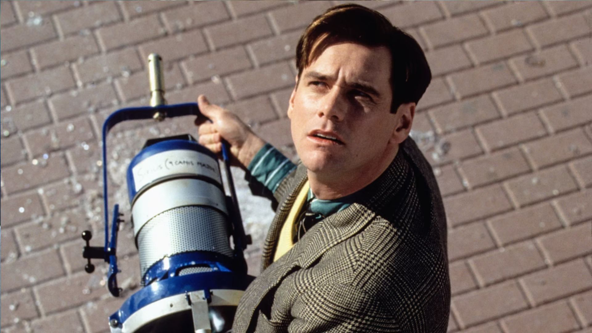 Jim Carrey as Trueman is the lead of a reality show that exposes his whole life to the viewers for entertainment | Image Source: Paramount Pictures