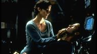 Anne Moss and Keanu Reeves in The Matrix / Image Source: Getty