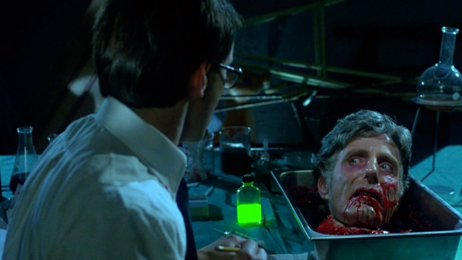 Jeffrey Combs and David Gale in Re-Animator (Image via Prime Video)