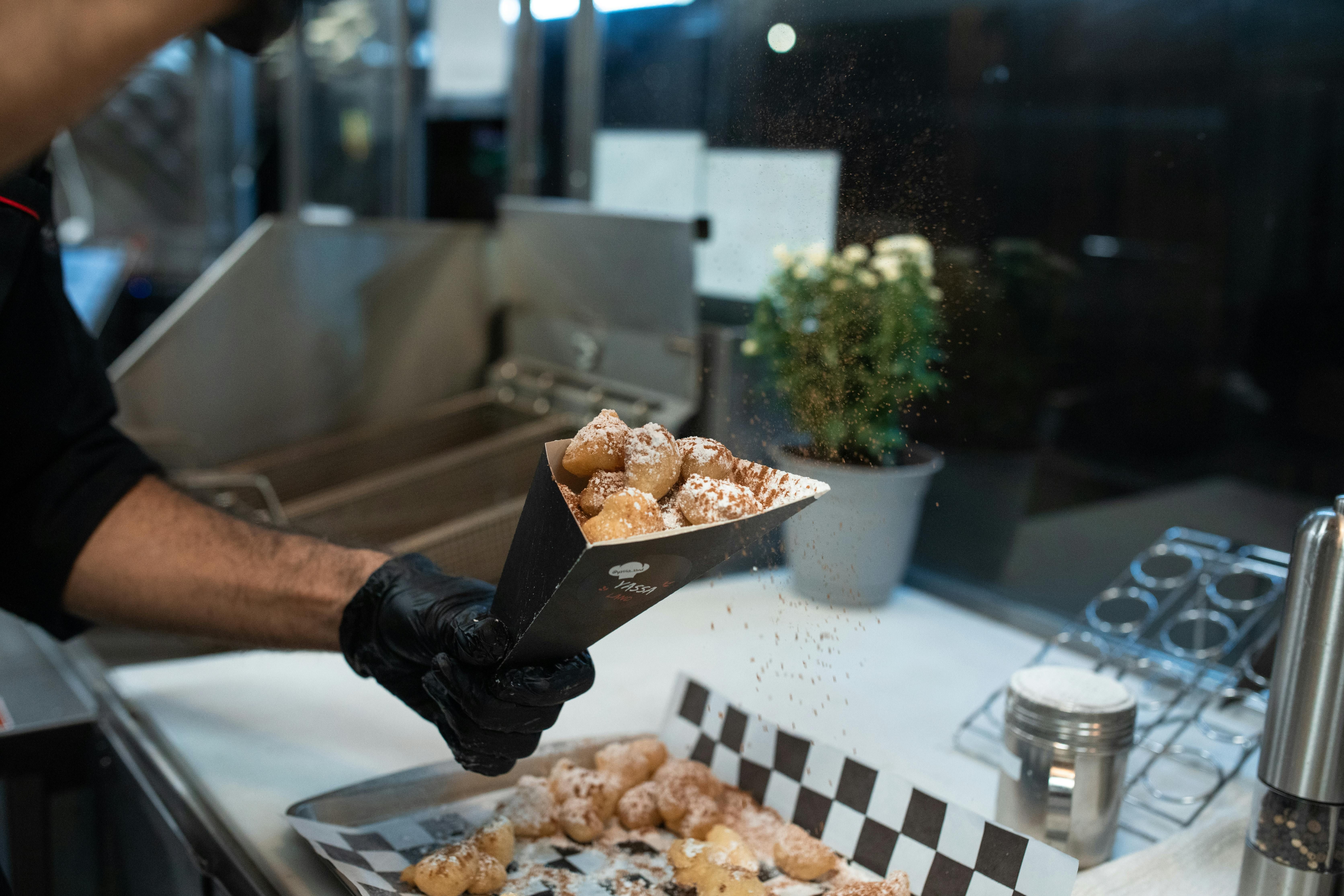 Representative stock image. Sprinkling of Cocoa Powder on Beignet Fritters (Image via Pexels)