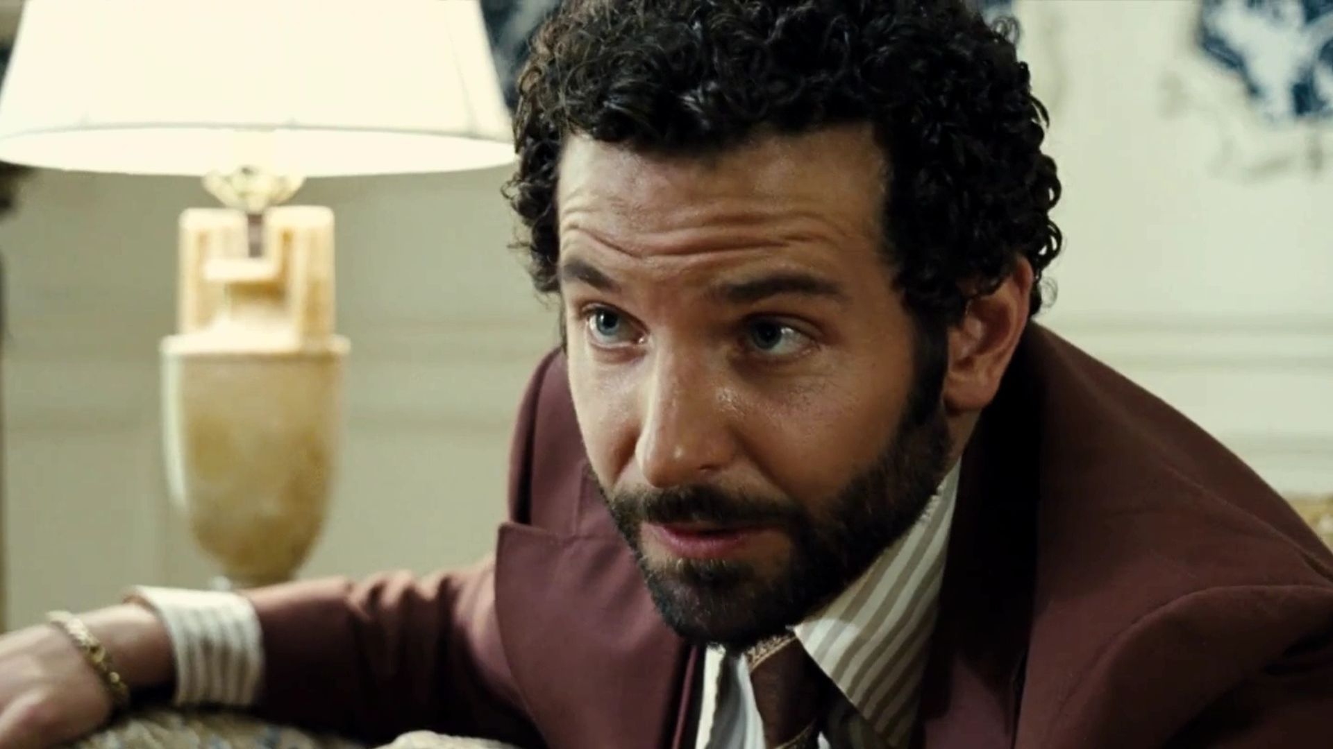 Bradley Cooper in American Hustle | Image Source: Lionsgate Play