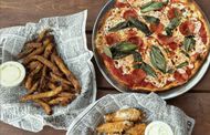 Pizza, chicken wings, and fries (Image via Instagram/@2_brospizza)