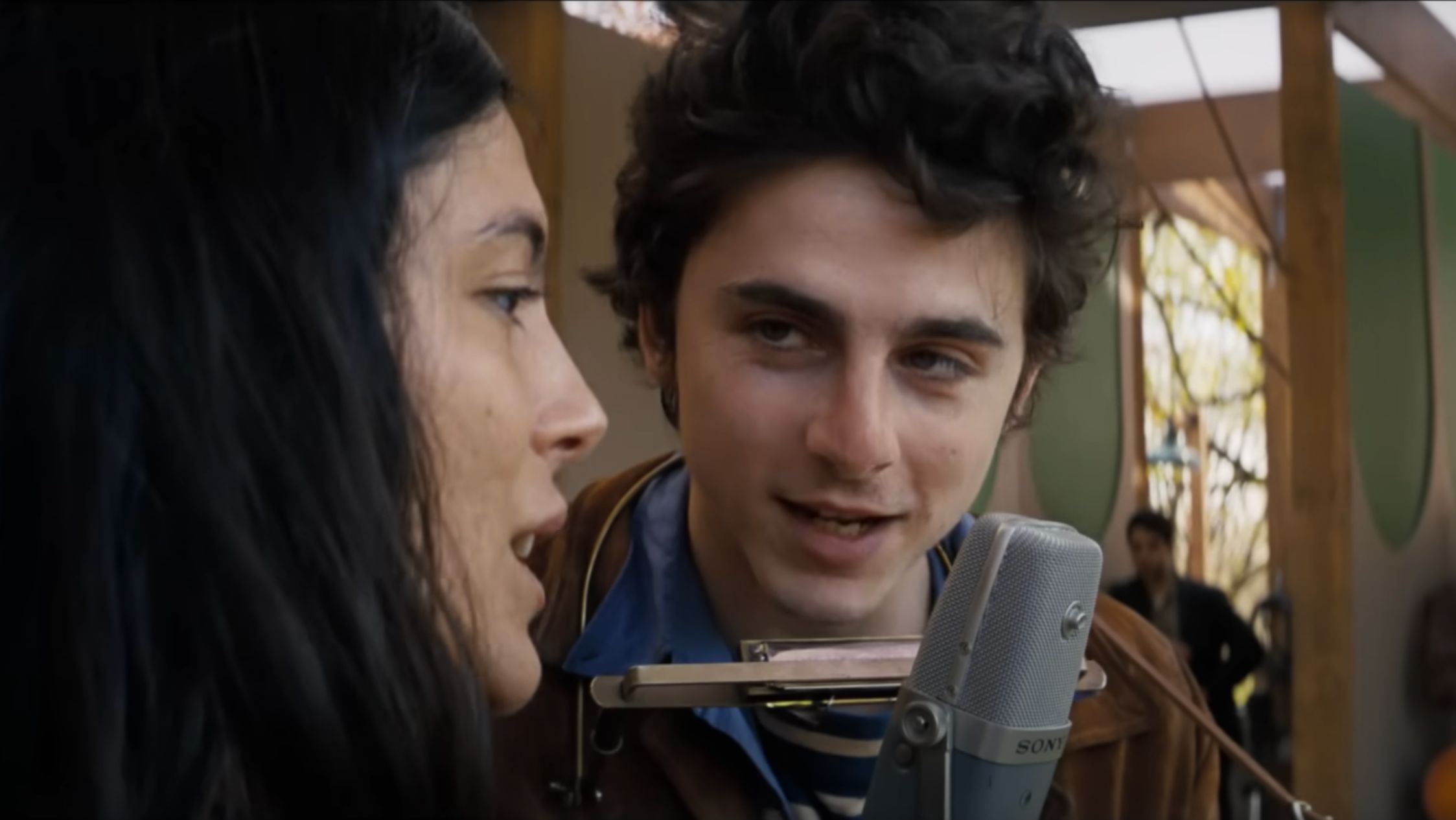 Timoth&eacute;e Chalamet and Monica Barbaro (Image via YouTube/@searchlightpictures)