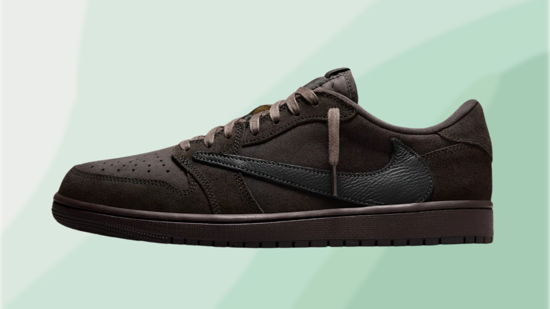 The Air Jordan silhouette is dressed in a chocolate hue and accented by the shoelaces in a lighter hue and black and bold reverse Swoosh logos on the sides (Image via Nike)