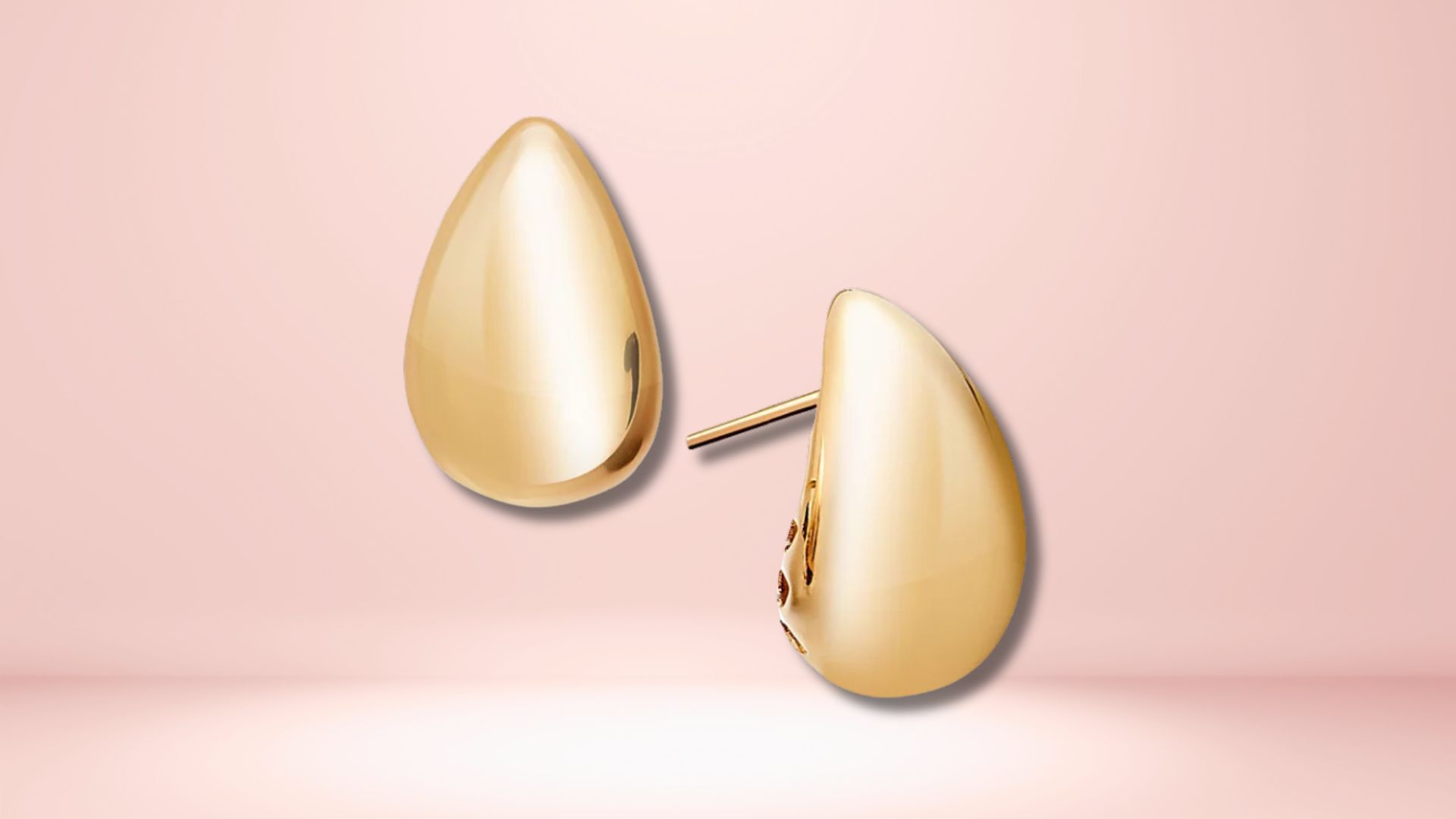 Macy&rsquo;s Polished Teardrop Dome Stud Earrings in 10k Gold (Image via Macy&rsquo;s)