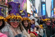 Revelers Celebrate The New Year In New York's Times Square - Source: Getty