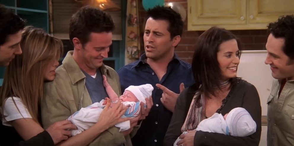 Why did Chandler and Monica adopt a baby in Friends?