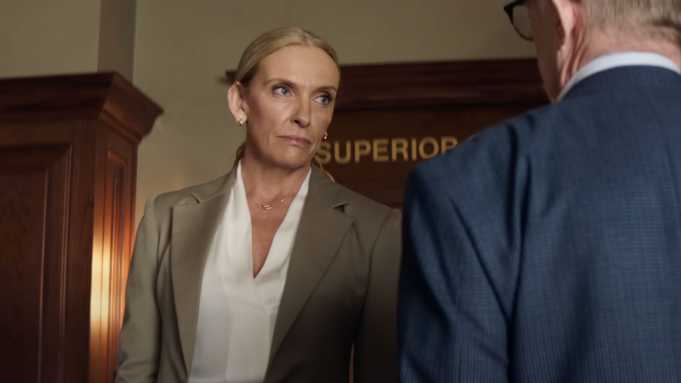 Toni Colette as Prosecutor Faith Killebrew (Image via YouTube/@WarnerBrosPictures)