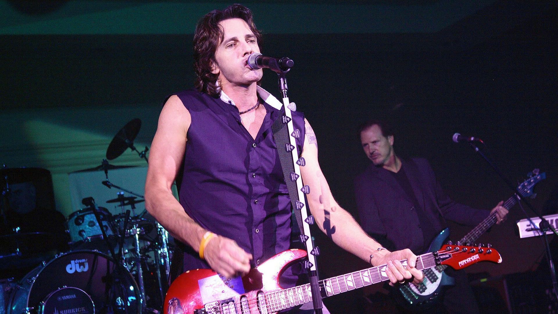 General Hospital alum Rick Springfield performing on stage. | Image Source: JPI