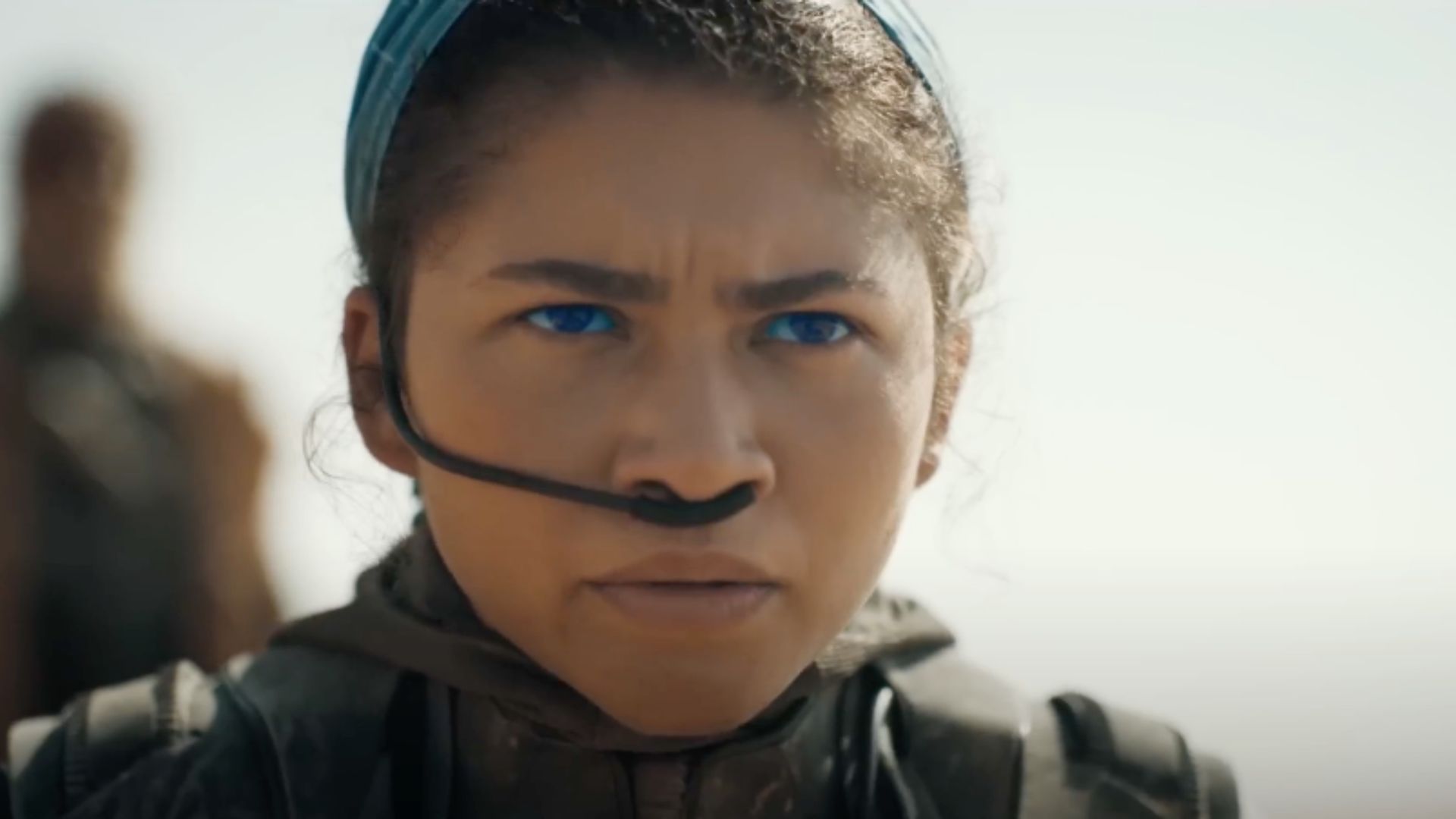 This is an image of a scene from of latest part of the Dune film series, Dune: Part Two. This is a close-up shot of Chani, portrayed by Zendaya