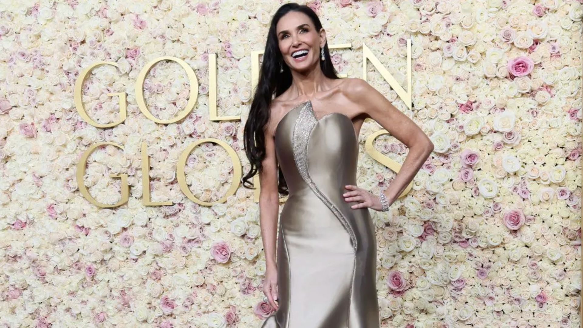 Demi Moore poses on the red carpet at the Golden Globes | Image Source: Getty Images