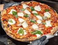 Pizza from L'industrie Pizzeria (Image via Instagram/@lindustriebk)