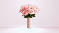 This bouquet arrangement features 12 pink roses (Image via 1-800-Flowers)
