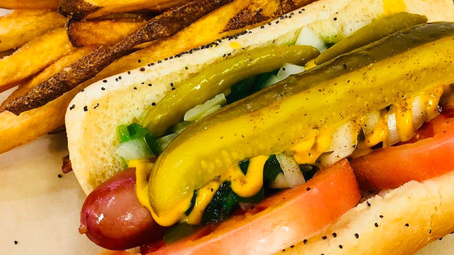 Chicago-style hot dog and fresh-cut fries from Jr&rsquo;s Red Hots. (Image via Instagram/@jrsredhots)