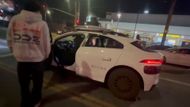 The vandalized robotaxi in LA's Beverly Grove neighborhood (Image via kick.com/conner)