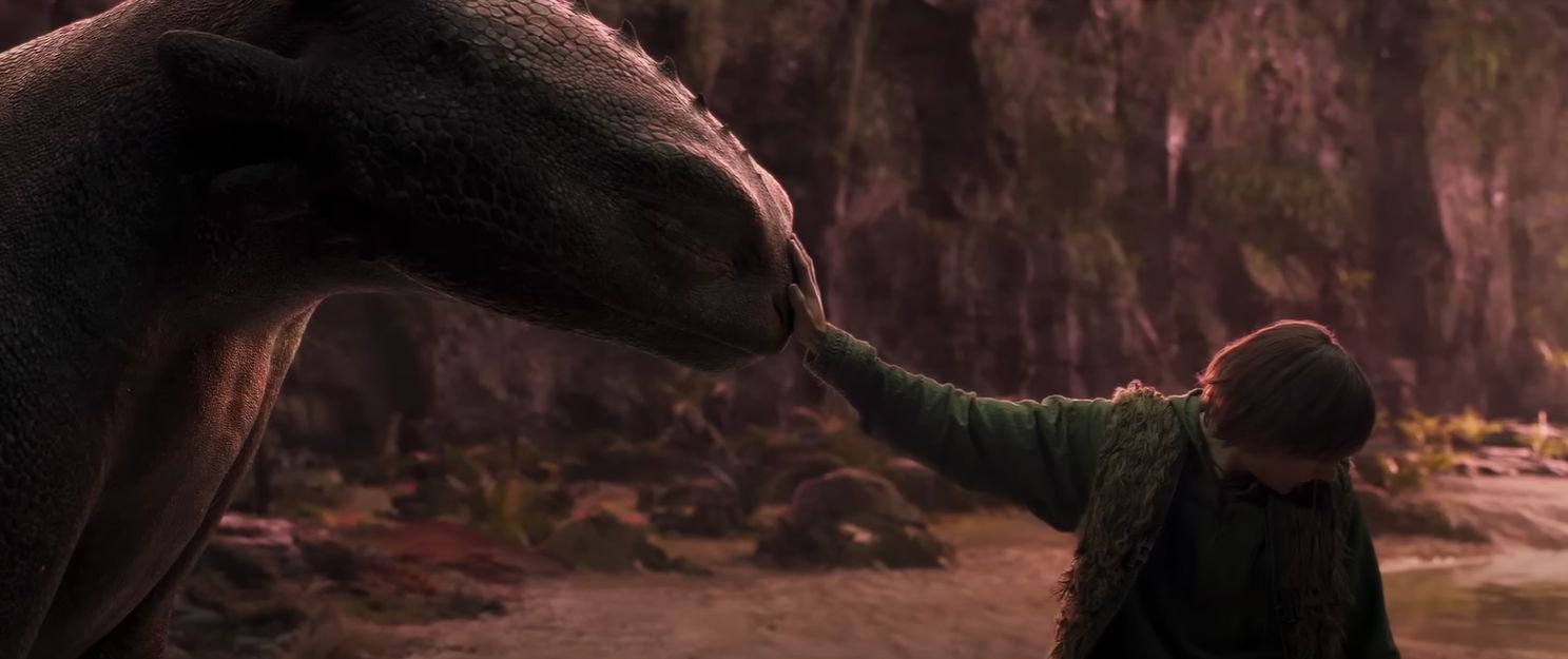 Who is the director of How to Train Your Dragon live-action?