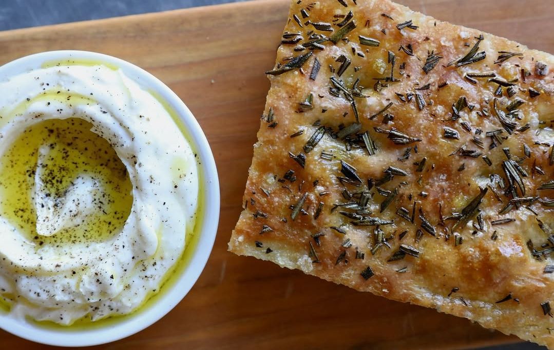 Rosemary focaccia with whipped ricotta &amp; olive oil from Cookshop (Image via Instagram/@cookshopnyc)