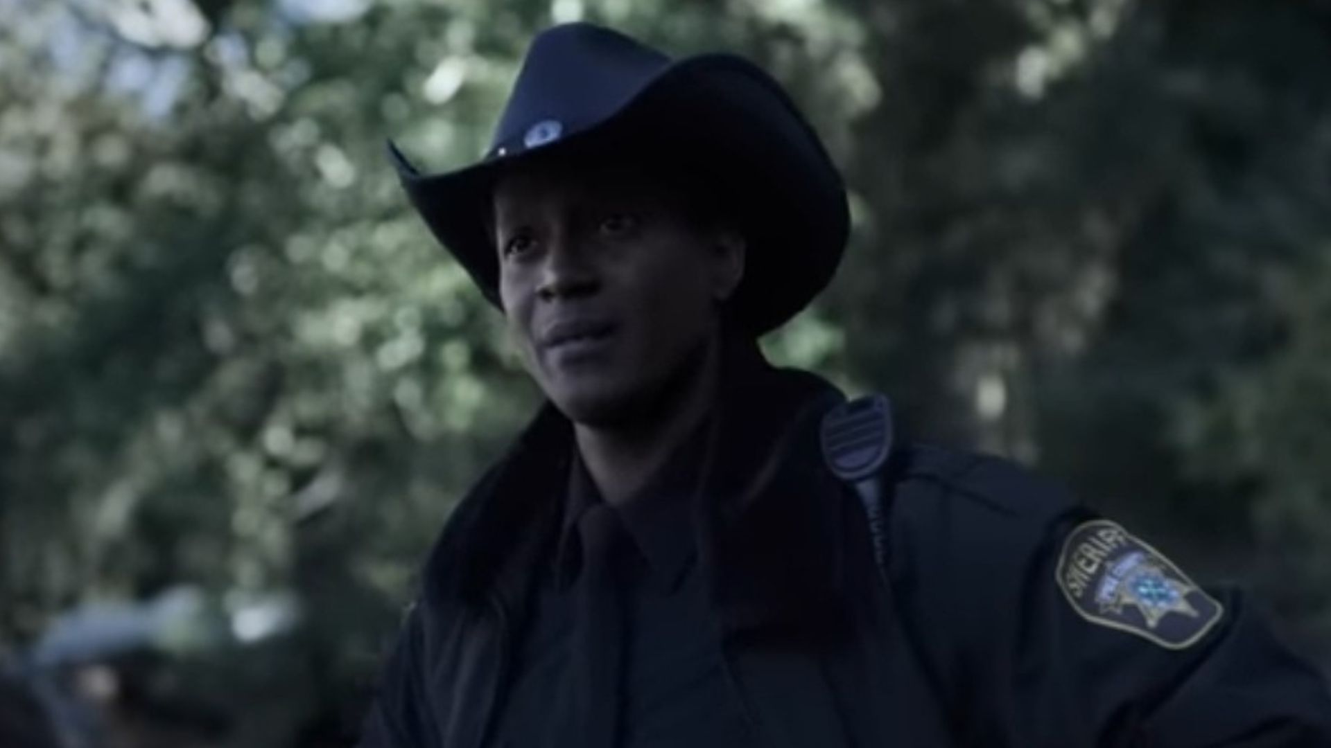 Corey Reynolds as Sheriff Mike in Resident Alien (Image Via YouTube/IGN)