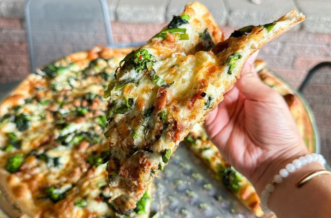 Sausage, broccoli rabe pizza from Naples Pizza Farmington, CT. (Image via Instagram/@naplespizzact)