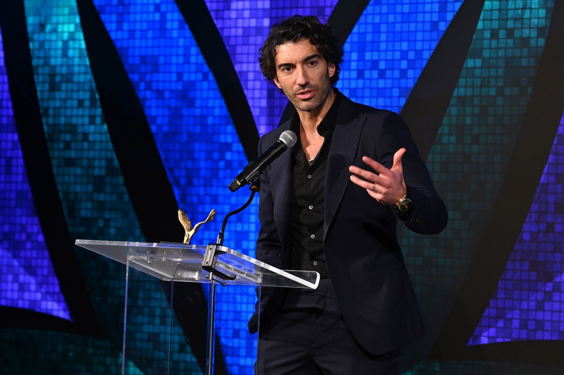 Justin Baldoni speaks onstage at the Vital Voices 12th Annual Voices of Solidarity Awards. (Image via Getty)