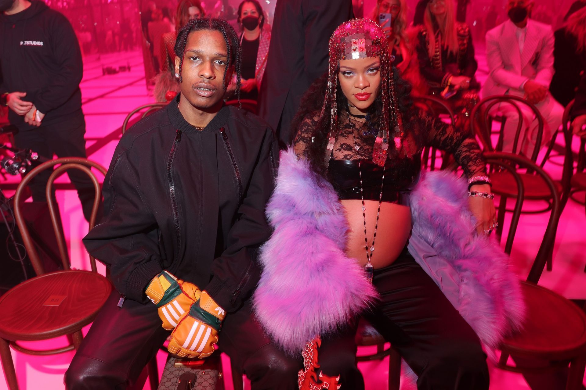 Asap Rocky and a pregnant Rihanna are seen at the Gucci show during Milan Fashion Week Fall/Winter 2022/23 on February 25, 2022 in Milan, Italy. (Photo by Victor Boyko/Getty Images for Gucci)