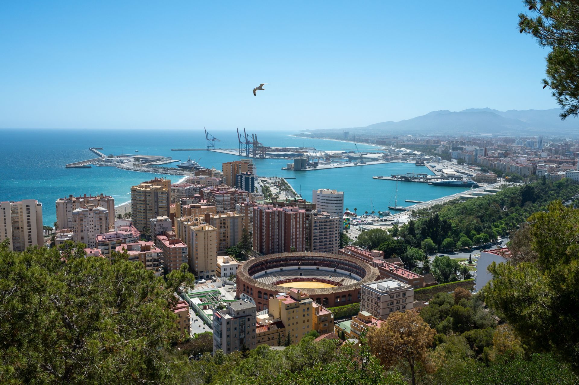 A city view of Malaga featuring La Malagueta Bullring, Port of Malaga, and the city&#039;s coastline where The Snow Girl Season 2 is filmed (Photo by John Keeble/Getty Images)