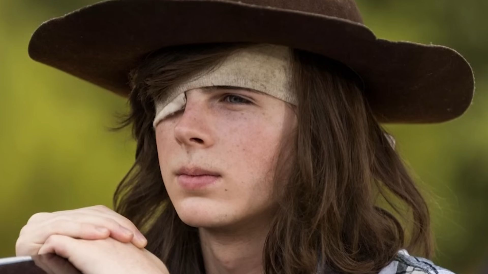 Chandler Riggs in The Walking Dead | Image via AMC Studios 