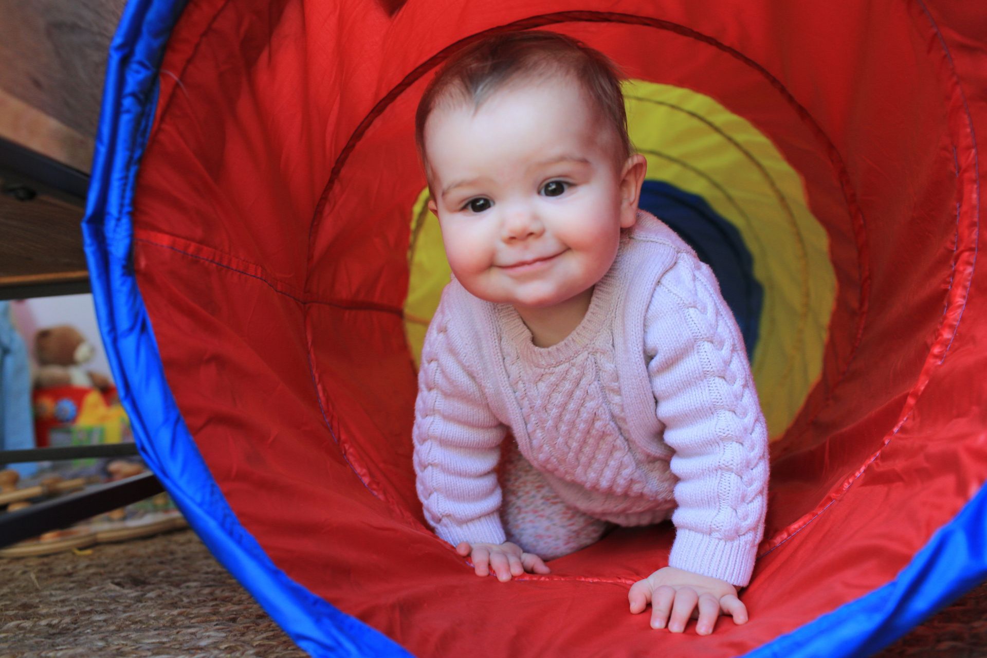 Toddler crawling through a tunnel - Source: Getty