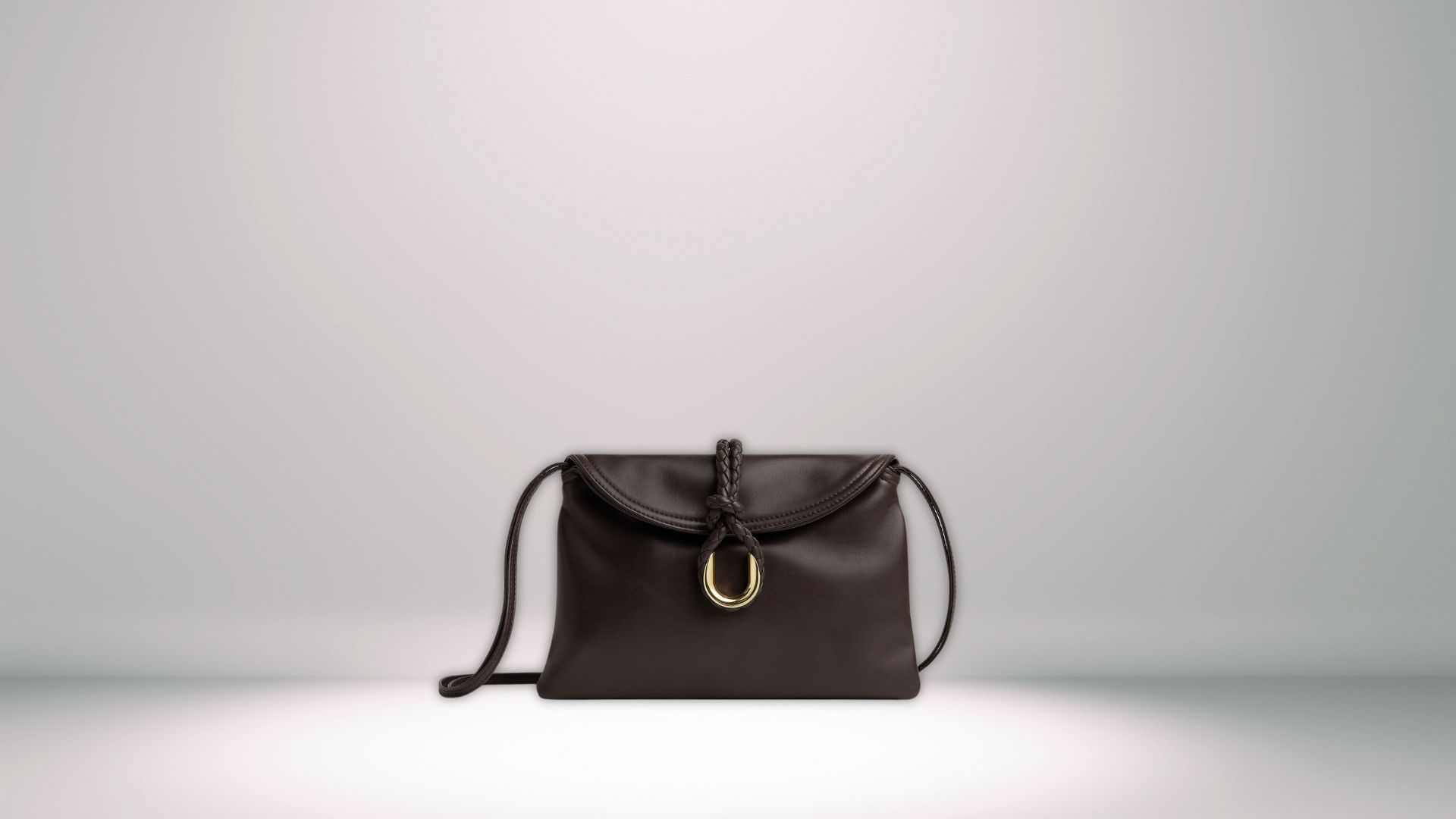 Small Liberta Leather Cross-Body Bag (Image via bottegaveneta.com)