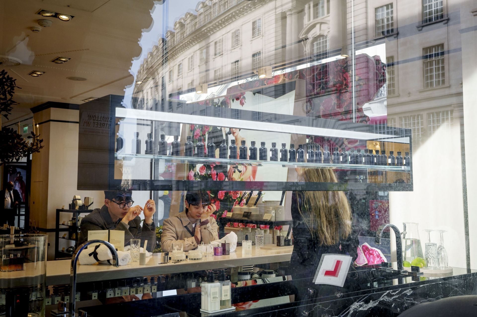 Foreign Tourists Smell Perfumes - Source: Getty