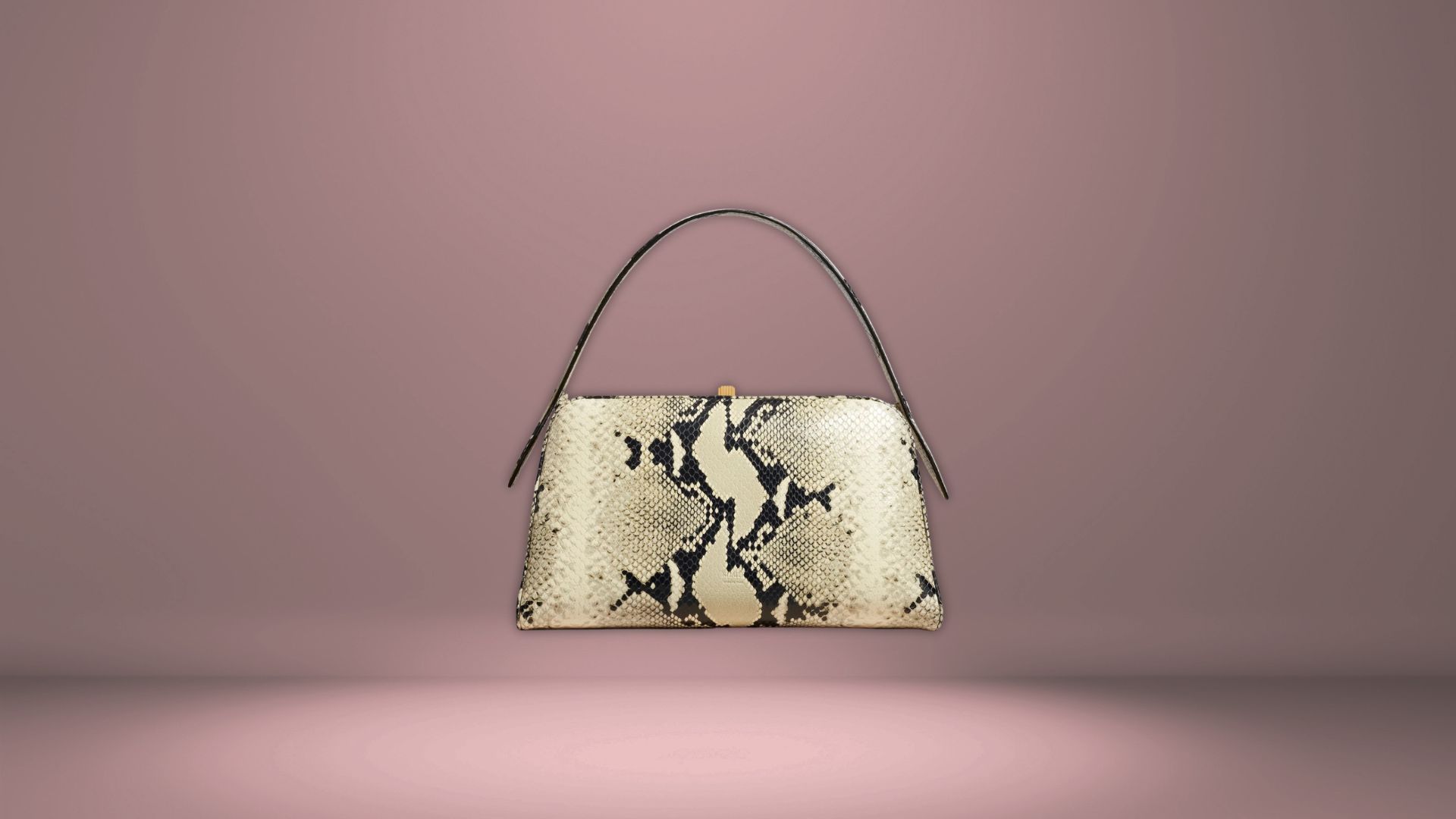 Snake Prints handbag trend (Image via Khaite)