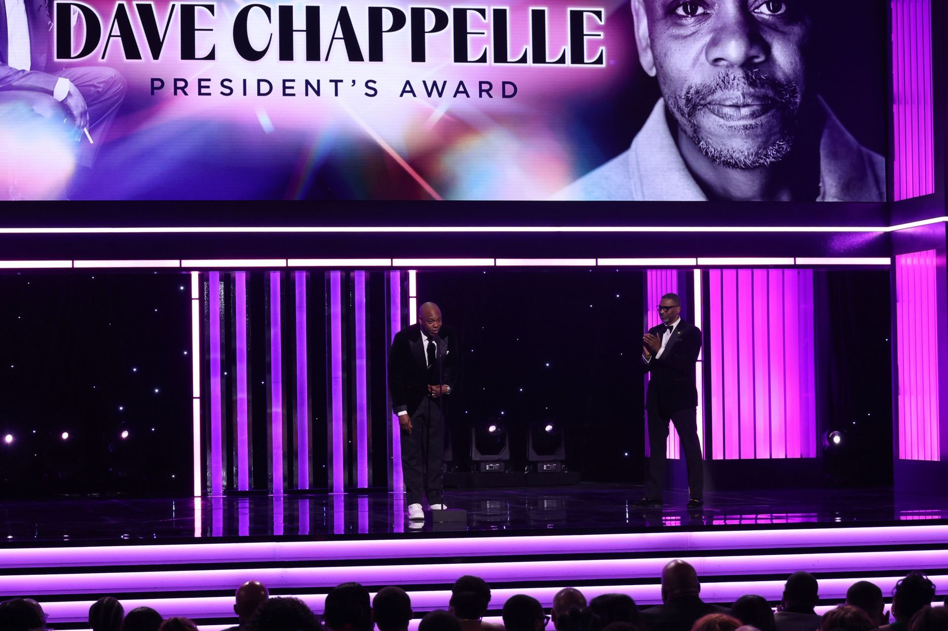 Honoree Dave Chappelle accepts the NAACP President&#039;s Award from Derrick Johnson, President and CEO, NAACP, onstage during the 56th NAACP Image Awards at Pasadena Civic Auditorium on February 22, 2025 in Pasadena, California. (Photo by Johnny Nunez/Getty Images for BET)