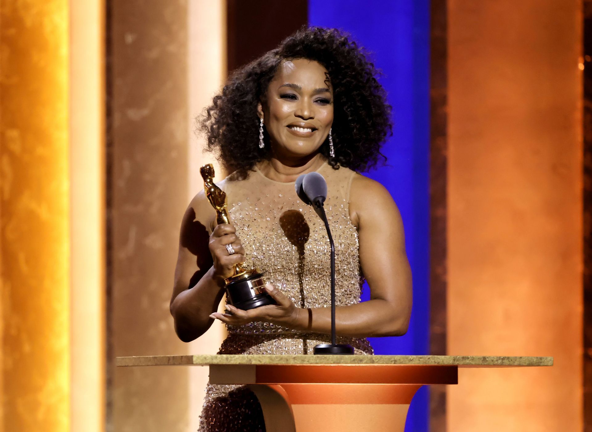 Angela Bassett accepts an honorary Oscar onstage during the Academy Of Motion Picture Arts &amp; Sciences&#039; 14th Annual Governors Awards at The Ray Dolby Ballroom on January 09, 2024 (Image via Getty)