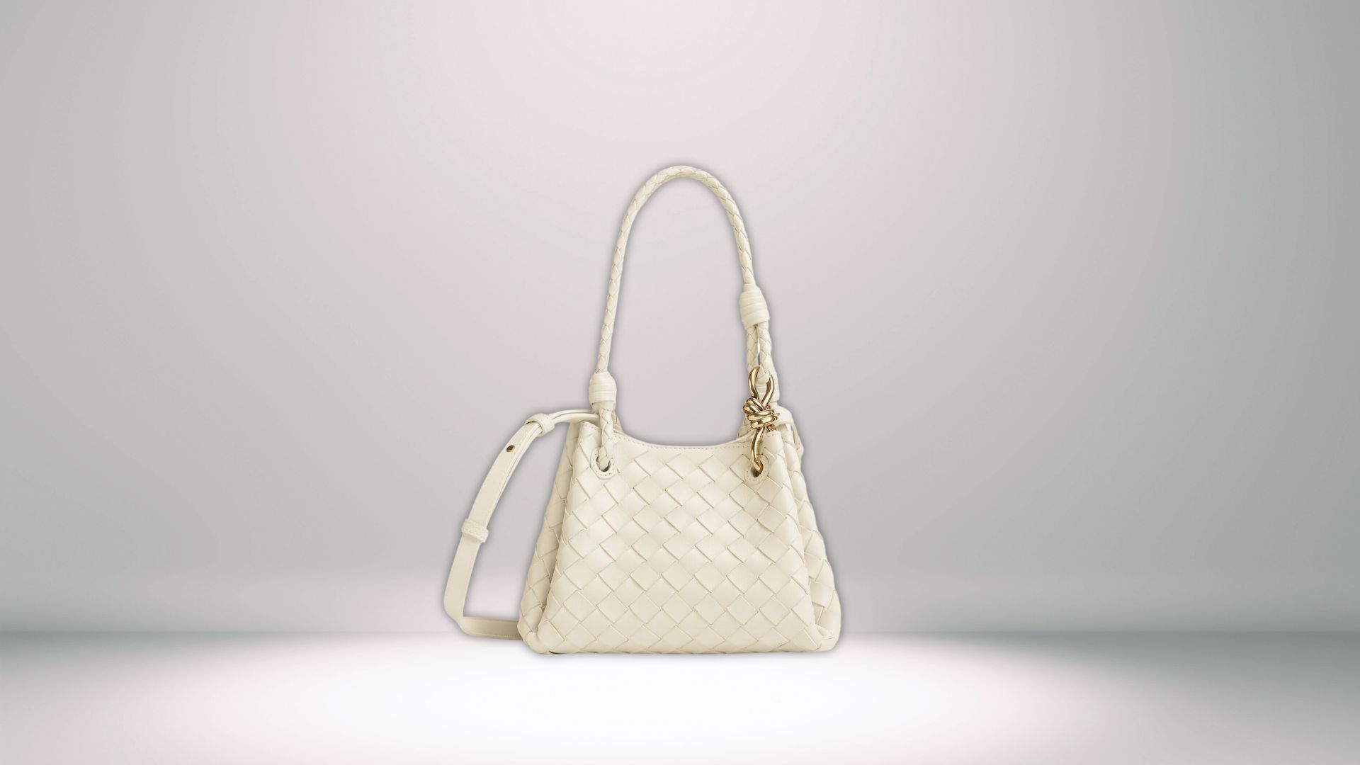 Parachute Small Intrecciato Leather Shoulder Bag (Image via bottegaveneta.com)