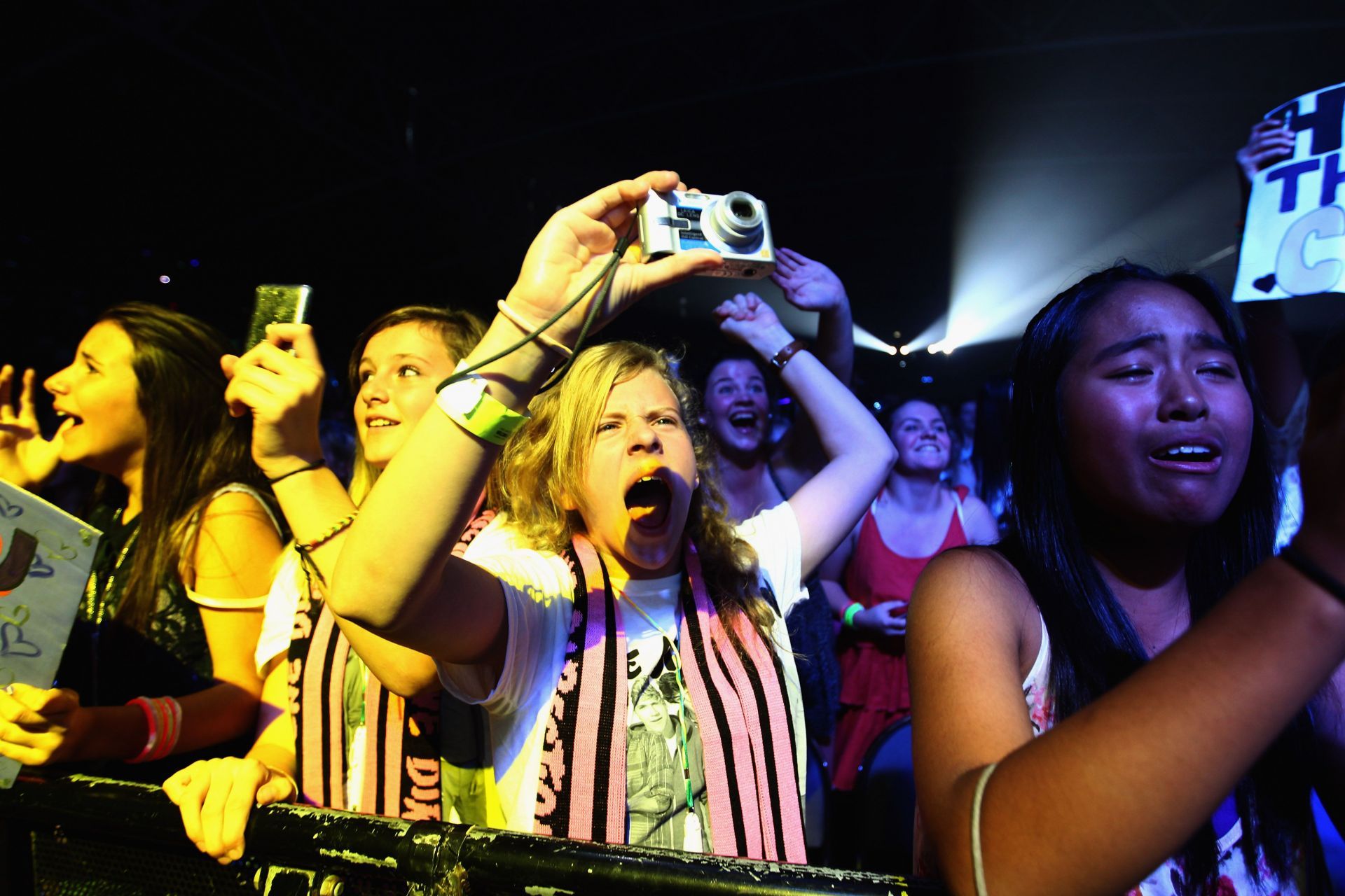 One Direction fans during the band&#039;s concert at Trusts Stadium on April 21, 2012 in New Zealand. (Image via Getty)