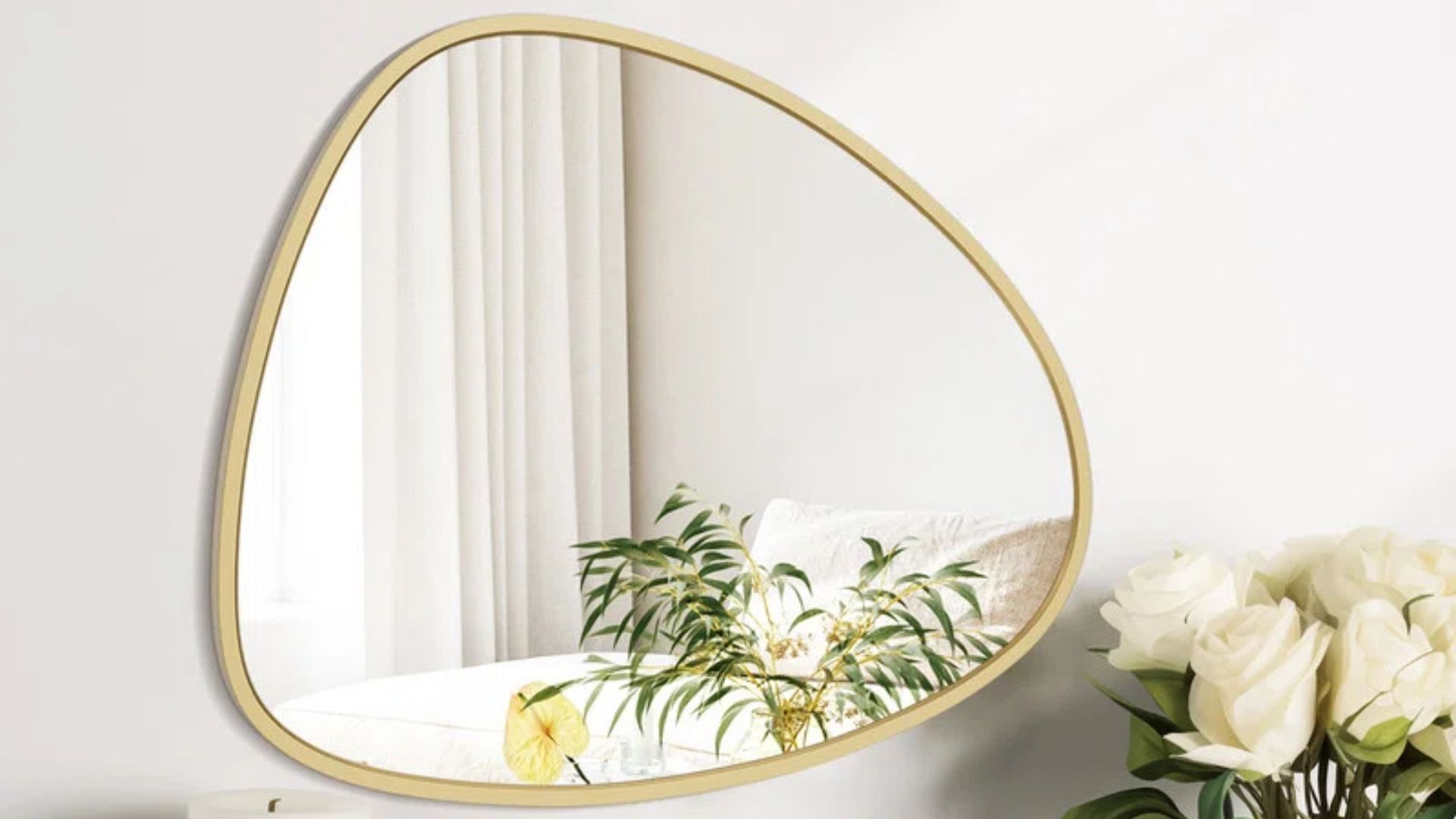 Aluminum Frame Irregular Wall Decoration Mirror (Image via Wayfair)