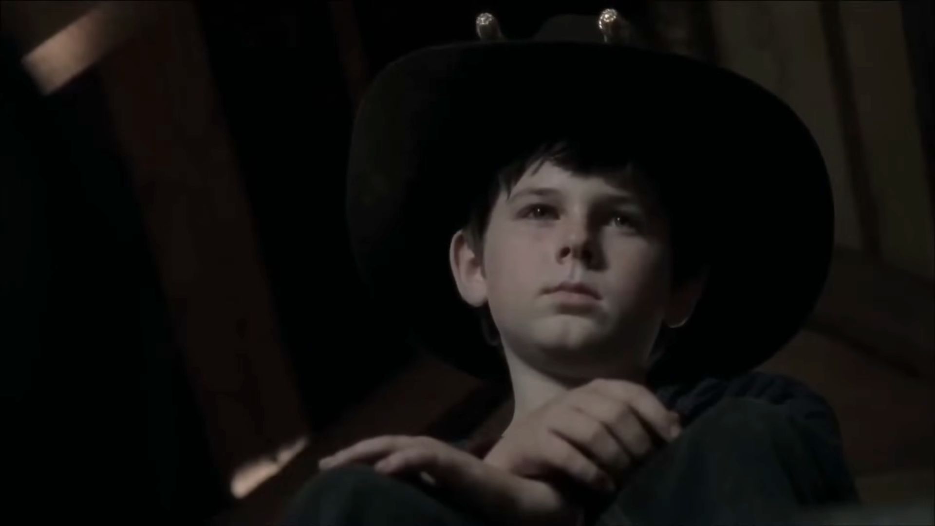 Chandler Riggs in The Walking Dead | Image via AMC Studios