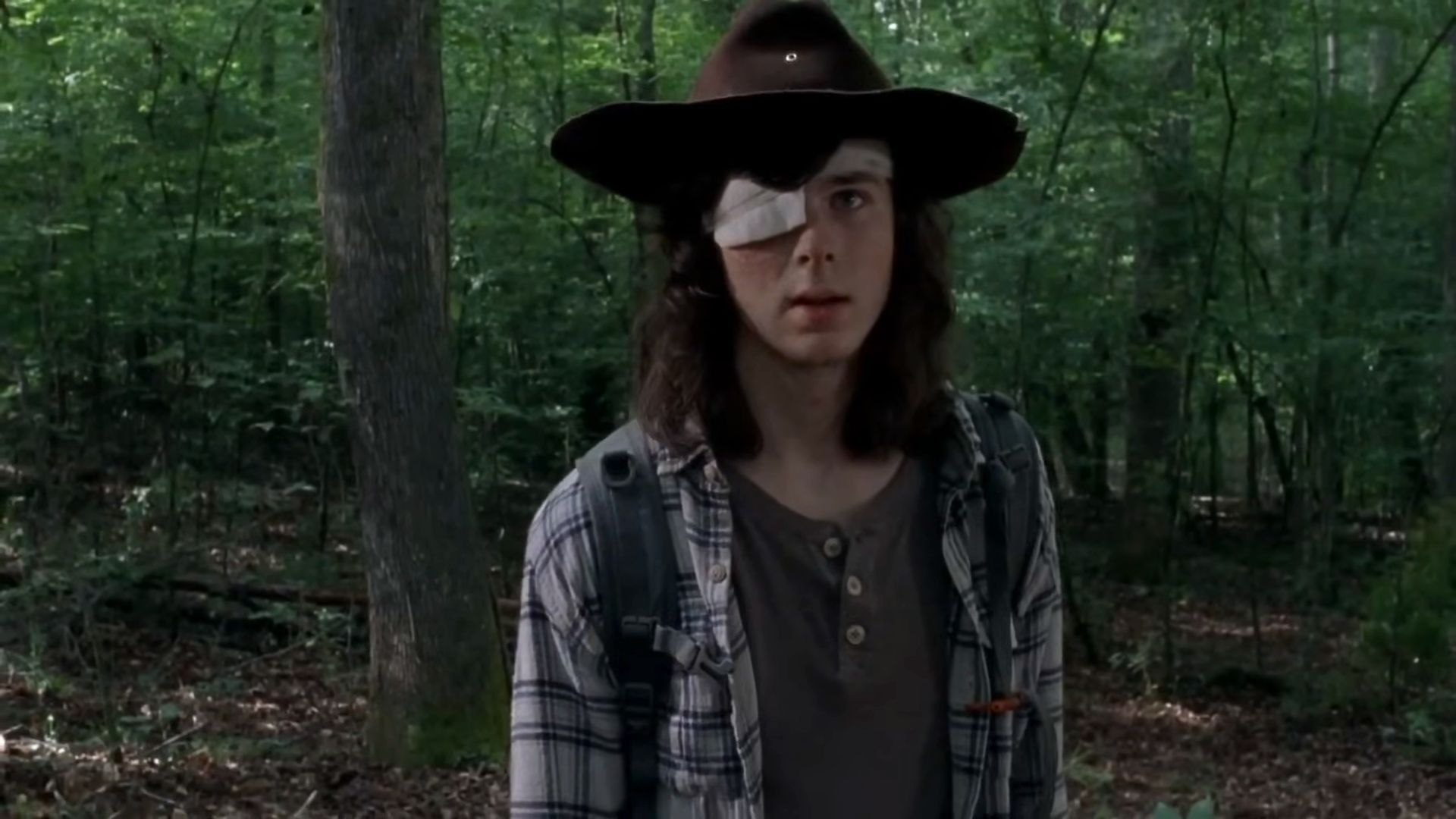 Chandler Riggs in The Walking Dead | Image via AMC Studios