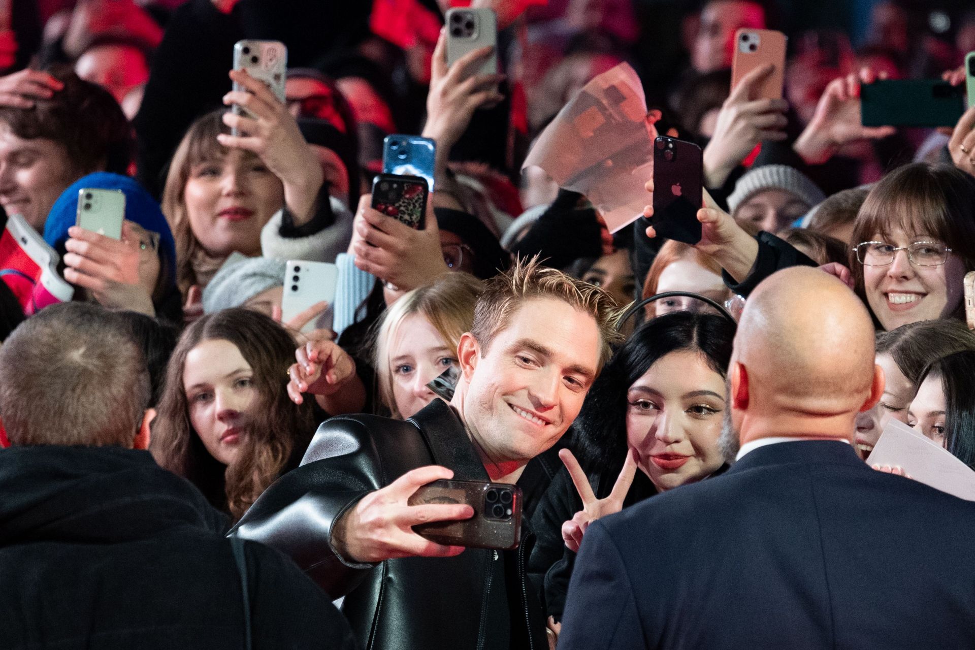 Robert Pattinson reacts with fans as he attends the &quot;Mickey 17&quot; premiere during the 75th Berlinale International Film Festival Berlin (Source: Getty)